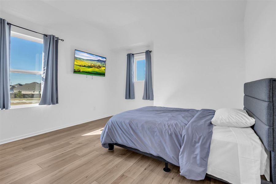 Third upstairs bedroom, ideal for guests, family, or dedicated workspace. Third upstairs bedroom, ideal for guests, family, or dedicated workspace.