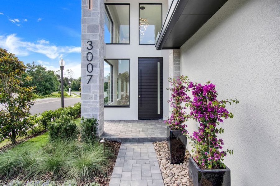 Representative exterior photo of a completed home built from the Aspen Estate by ABD Development in Hampton Green at Providence, Davenport, FL (Image 40). Representative exterior photo of a completed home built from the Aspen Estate by ABD Development in Hampton Green at Providence, Davenport, FL (Image 40).