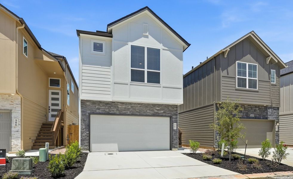 Front exterior of a new home in Rose Hill, San Antonio, TX, highlighting curb appeal (Image 24).