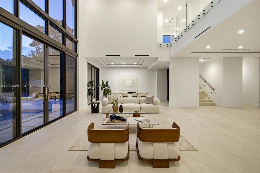 Lobby with dining area and staircase