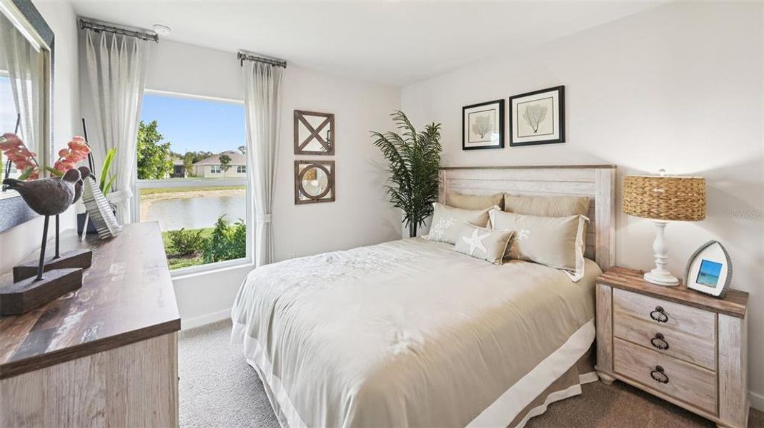 Furnished interior view inside a new home in Cove at West Port - Express, Port Charlotte (Image 8).