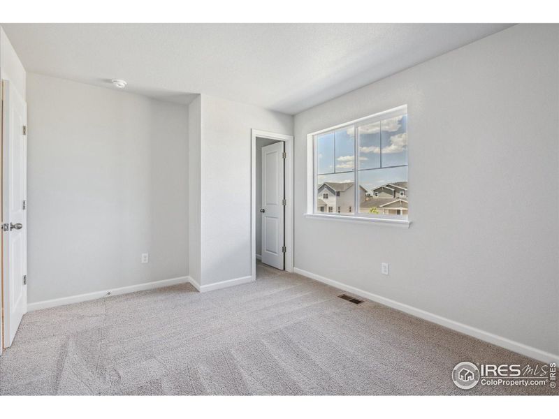 Spacious, unfurnished interior of a new home in Prairie Song, Windsor (Image 17).