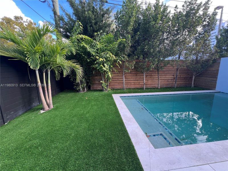Exterior details and patio area of a home in , Miami (Image 3). Exterior details and patio area of a home in , Miami (Image 3).