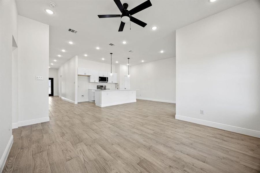 Spacious interior featuring wood-finish flooring throughout Spacious interior featuring wood-finish flooring throughout