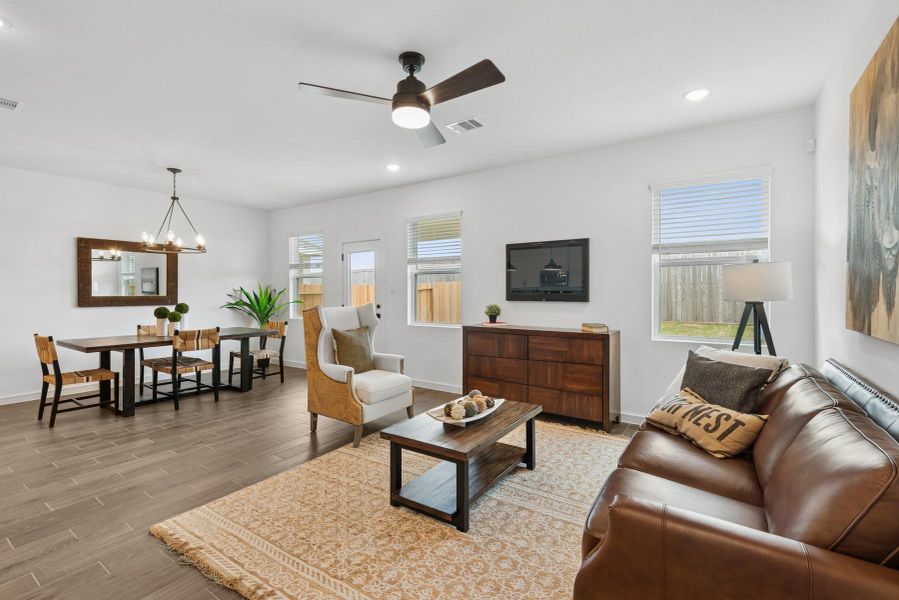 Open great room and dining area (*Photo not of actual home and used for illustration purposes only.)