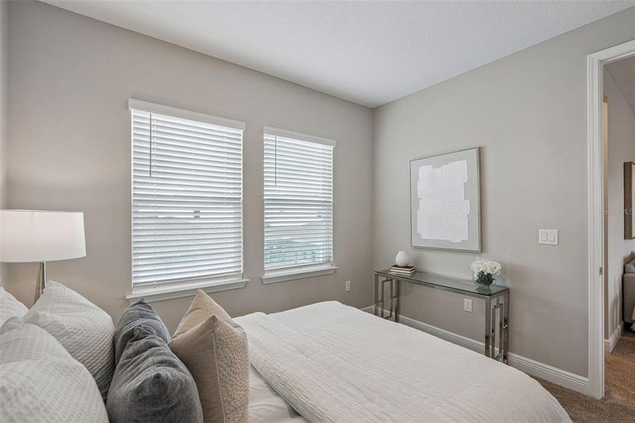 Furnished interior view inside a new home in Laureate Park, Orlando (Image 43).