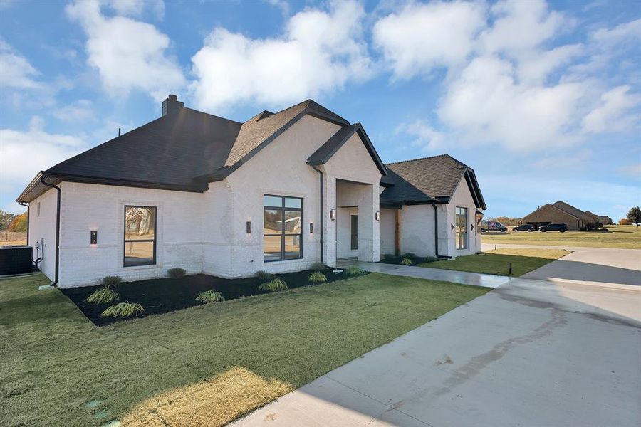 Front exterior of a new home in , Union Valley, TX, highlighting curb appeal (Image 23). Front exterior of a new home in , Union Valley, TX, highlighting curb appeal (Image 23).