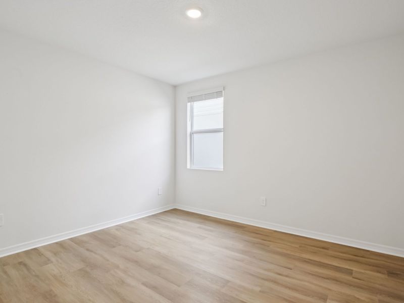 Spacious, unfurnished interior of a new home in Oakfield Trails - Premier Series, Parrish (Image 9).