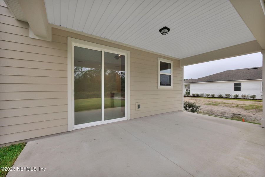 Exterior details and patio area of a home in Hyland Trail, Green Cove Springs (Image 25).