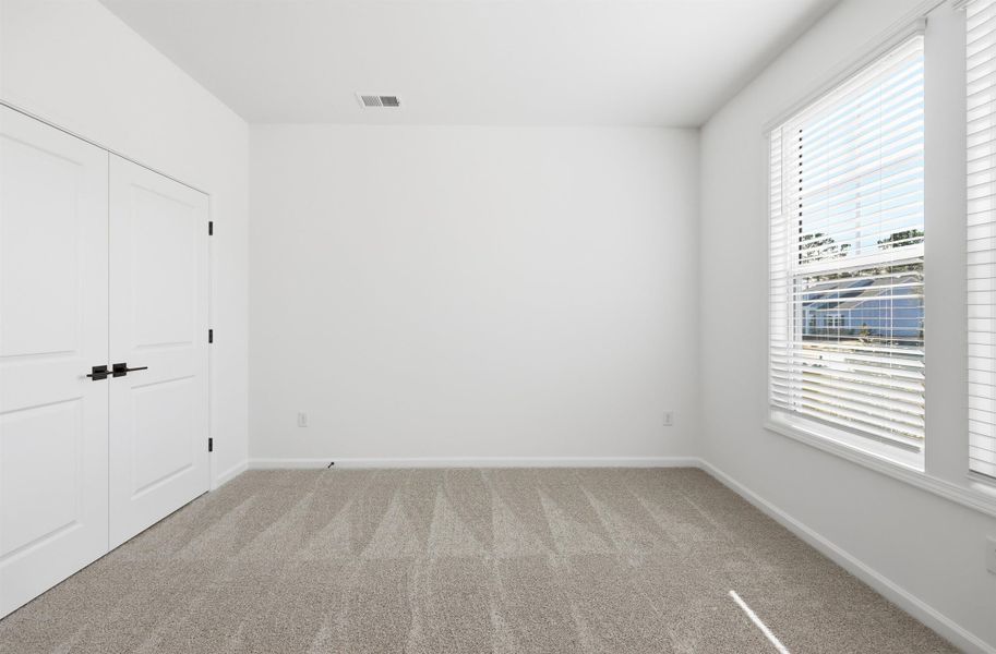 Spacious, unfurnished interior of a new home in Westwood Reserve, Conway (Image 28).