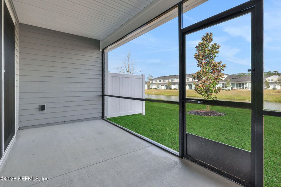 Exterior details and patio area of a home in Cherry Elm at SilverLeaf, St. Augustine (Image 28).