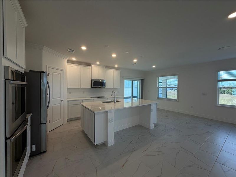 Furnished interior view inside a new home in Villa Pass, Mascotte (Image 4).