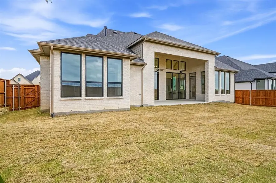 Exterior details and patio area of a home in Mustang Lakes, Celina (Image 2).