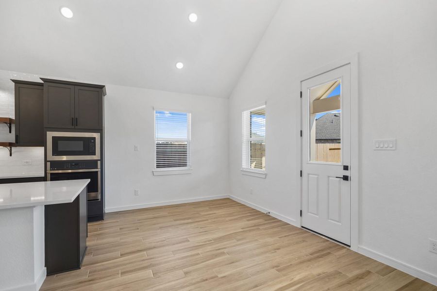 Sun-lit dining area (*Photo not of actual home and used for illustration purposes only.)