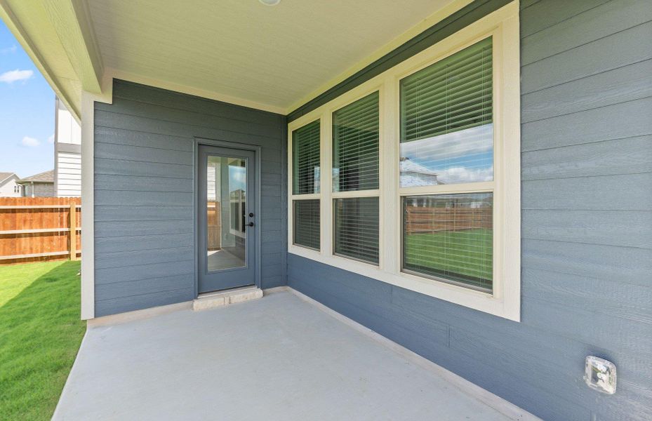 Exterior details and patio area of a home in Santa Rita Ranch, Liberty Hill (Image 3).