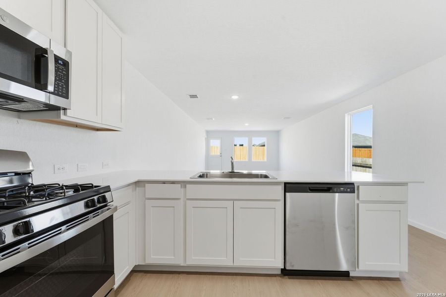 Furnished interior view inside a new home in Randolph Crossing, Converse (Image 4). Furnished interior view inside a new home in Randolph Crossing, Converse (Image 4).