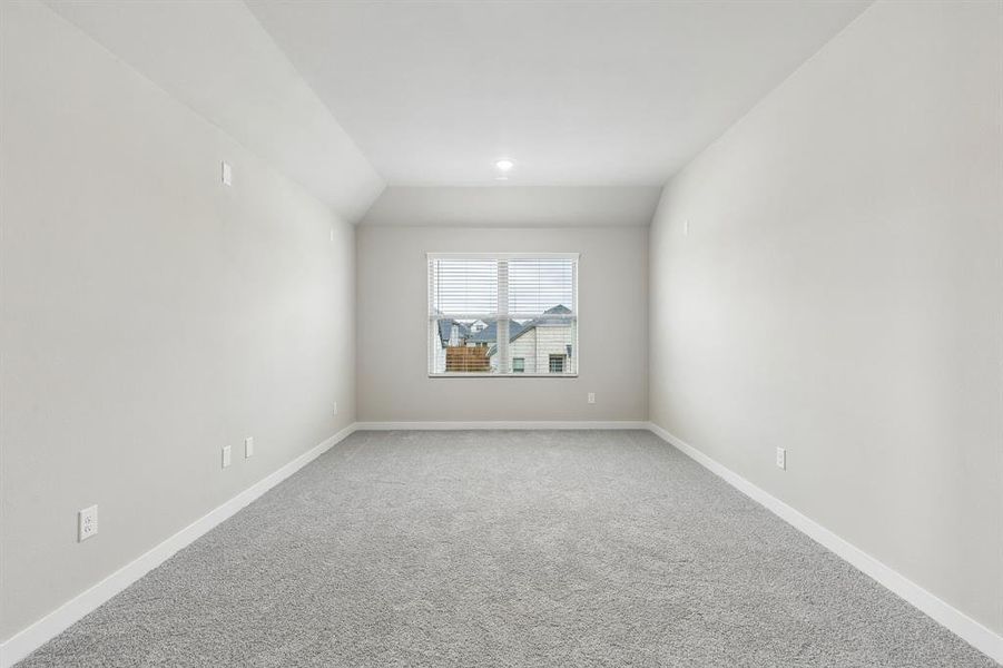 Media Room in the Winters home plan by Trophy Signature Homes – REPRESENTATIVE PHOTO