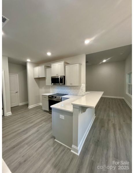Furnished interior view inside a new home in Crystal Village, Albemarle (Image 5). Furnished interior view inside a new home in Crystal Village, Albemarle (Image 5).