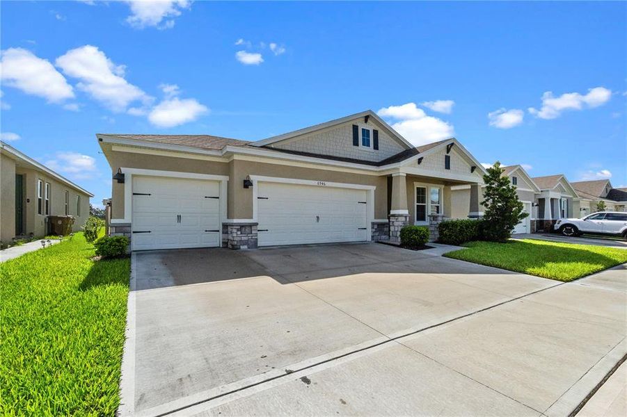 Front exterior of a new home in , Harmony, FL, highlighting curb appeal (Image 27).