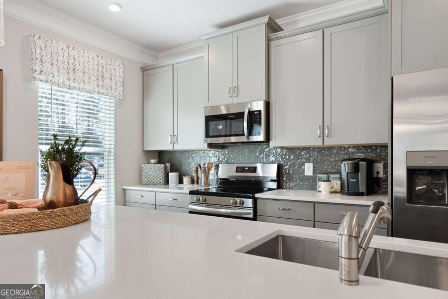 Furnished interior view inside a new home in Cobblestone Crossing Commons, Byron (Image 12).