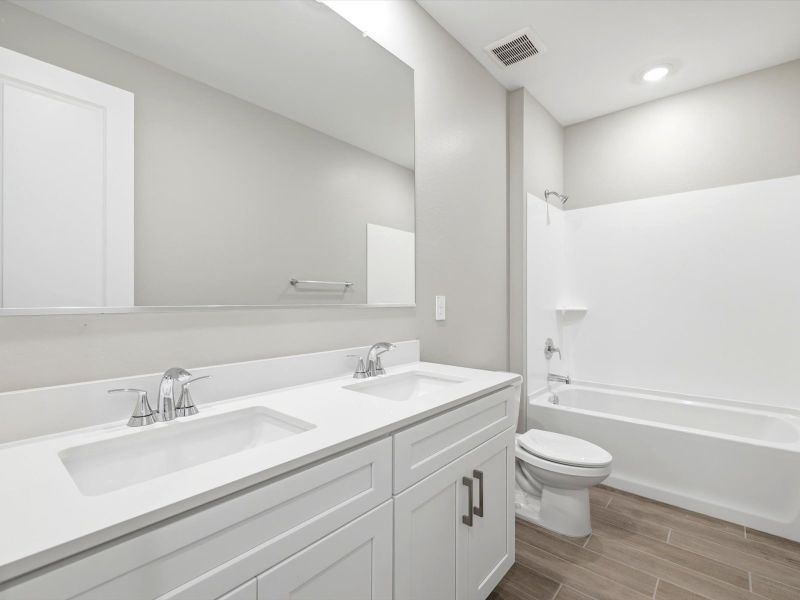 Furnished interior view inside a new home in Legacy Place, Glendale (Image 9). Furnished interior view inside a new home in Legacy Place, Glendale (Image 9).