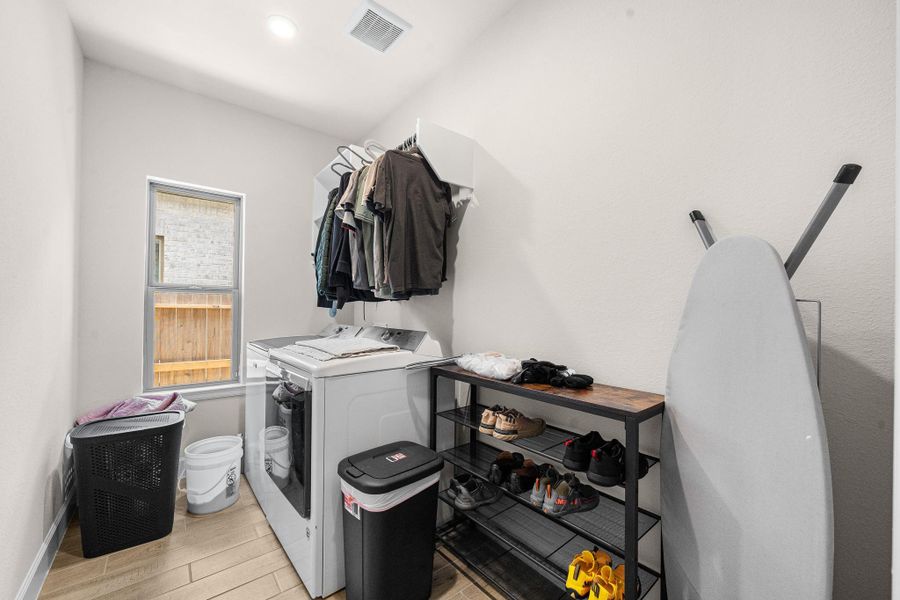 Furnished interior view inside a new home in Marvida, Cypress (Image 28).