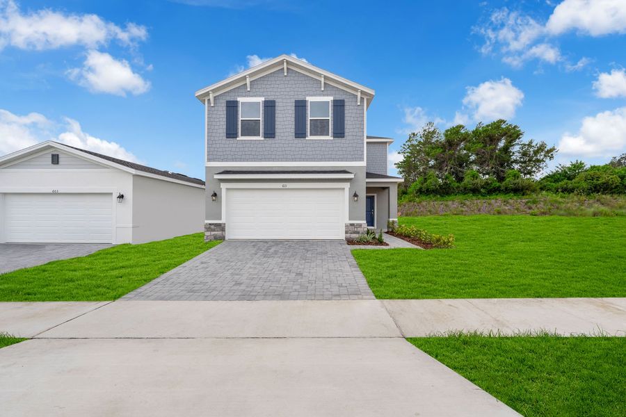 Representative exterior photo of a completed home built from the The Atrium by Stanley Martin Homes in Pine Grove Reserve, St. Cloud, FL (Image 18).