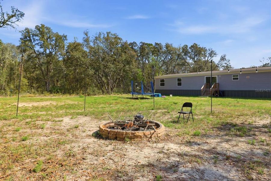 Exterior details and patio area of a home in , Bronson (Image 22).