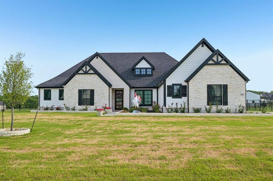 Front exterior of a new home in King Crossing Estates, Van Alstyne, TX, highlighting curb appeal (Image 2). Front exterior of a new home in King Crossing Estates, Van Alstyne, TX, highlighting curb appeal (Image 2).