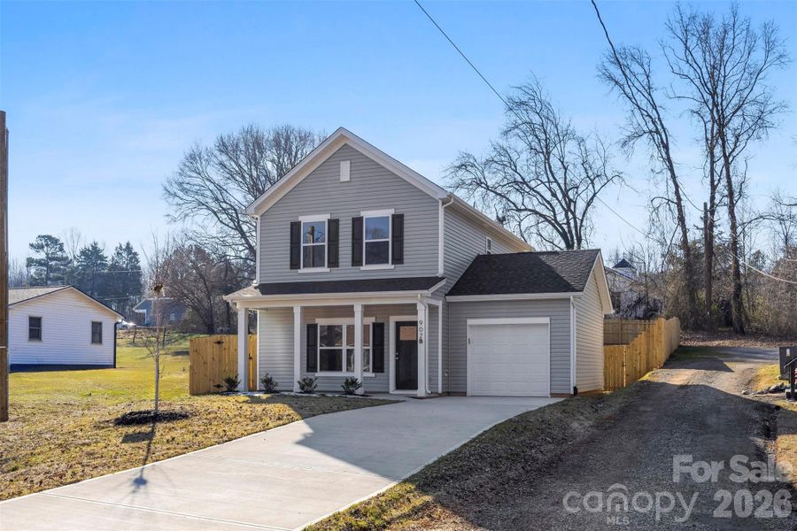 Front exterior of a new home in , Bessemer City, NC, highlighting curb appeal (Image 22).