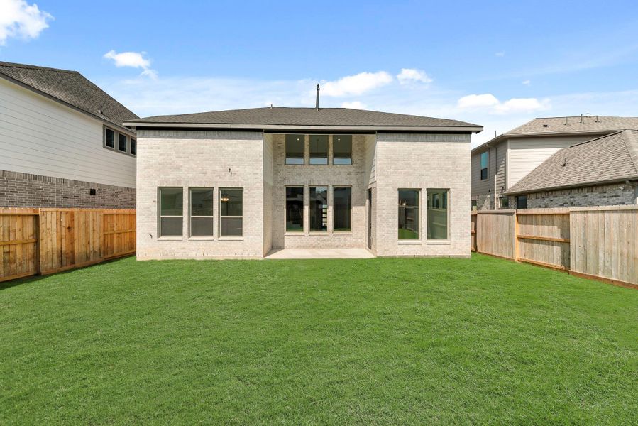 Exterior details and patio area of a home in , Brookshire (Image 2).