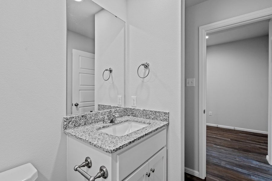 Representative furnished interior of a home built from the KINGSTON by D.R. Horton in Faculty Row, Abilene (Image 13).