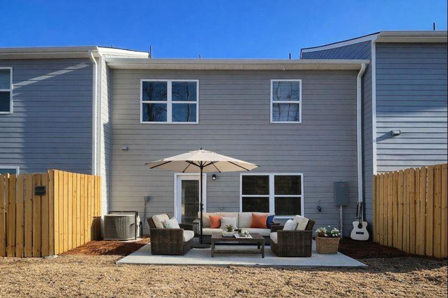 Exterior details and patio area of a home in The Enclave at Whitewater Creek, Union City (Image 3).