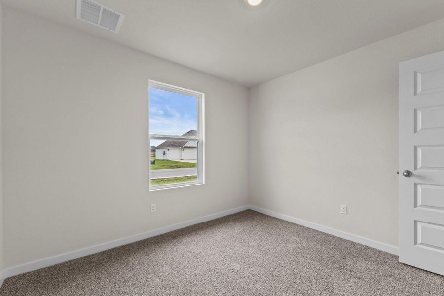 Spacious, unfurnished interior of a new home in Hartland Ranch, Lockhart (Image 21).