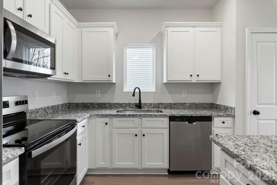 Furnished interior view inside a new home in Knights Bridge, Richburg (Image 4).