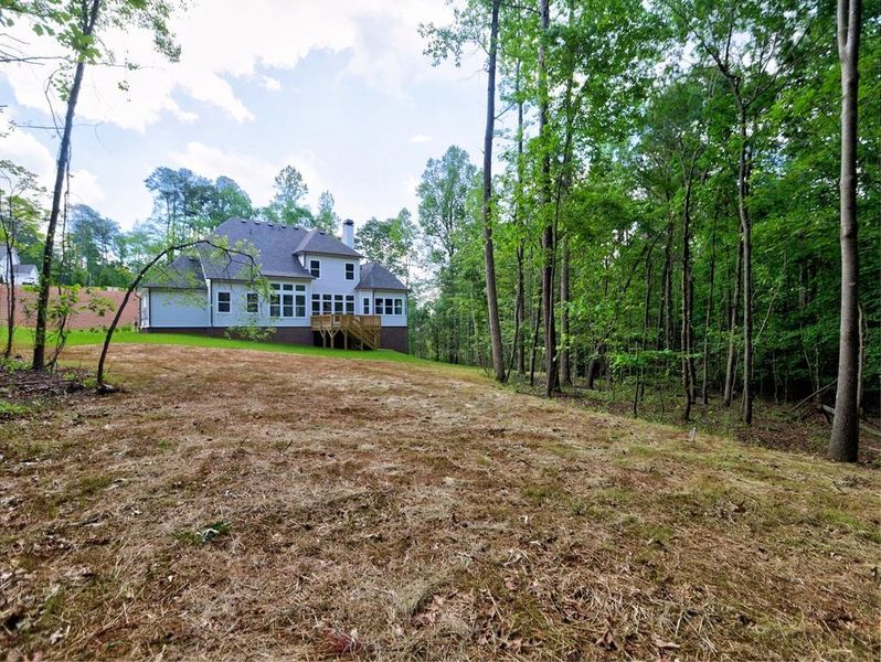 Front exterior of a new home in , Cumming, GA, highlighting curb appeal (Image 26). Front exterior of a new home in , Cumming, GA, highlighting curb appeal (Image 26).