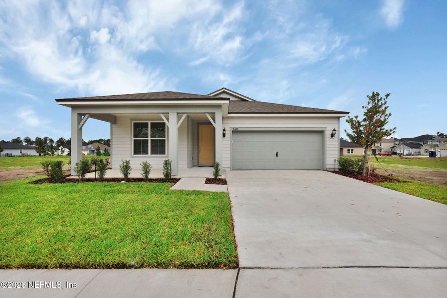 Front exterior of a new home in Hyland Trail, Green Cove Springs, FL, highlighting curb appeal (Image 1). Front exterior of a new home in Hyland Trail, Green Cove Springs, FL, highlighting curb appeal (Image 1).