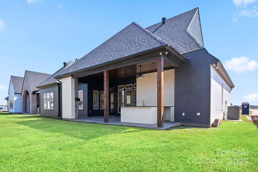 Front exterior of a new home in , Monroe, NC, highlighting curb appeal (Image 6).