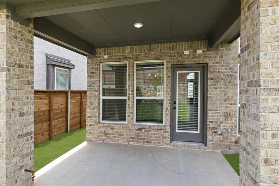 Exterior details and patio area of a home in Solterra, Mesquite (Image 24).