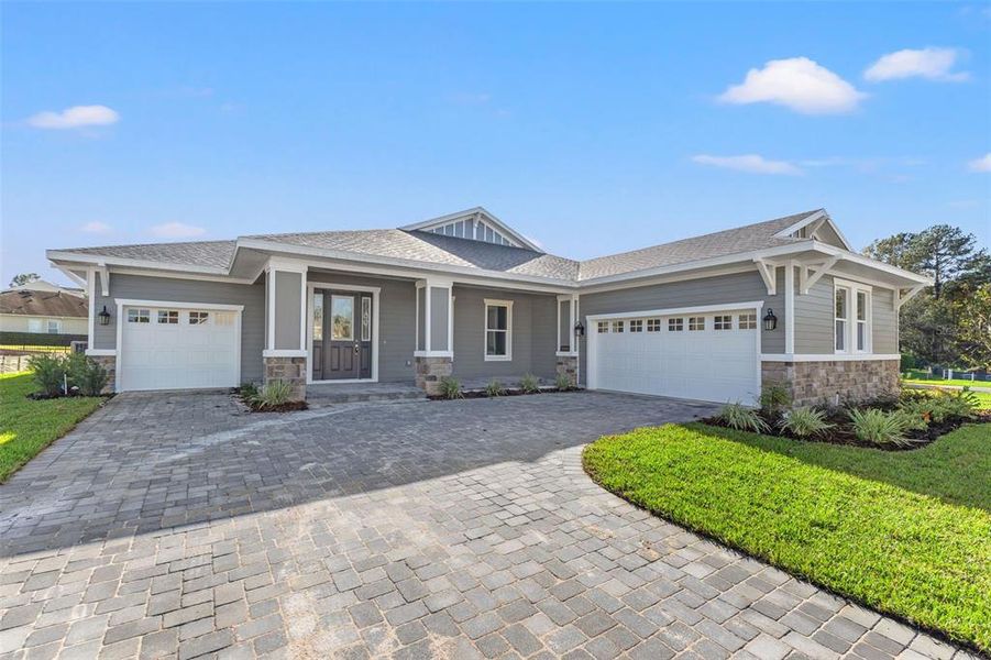 Front exterior of a new home in Southern Hills Plantation, Brooksville, FL, highlighting curb appeal (Image 24).