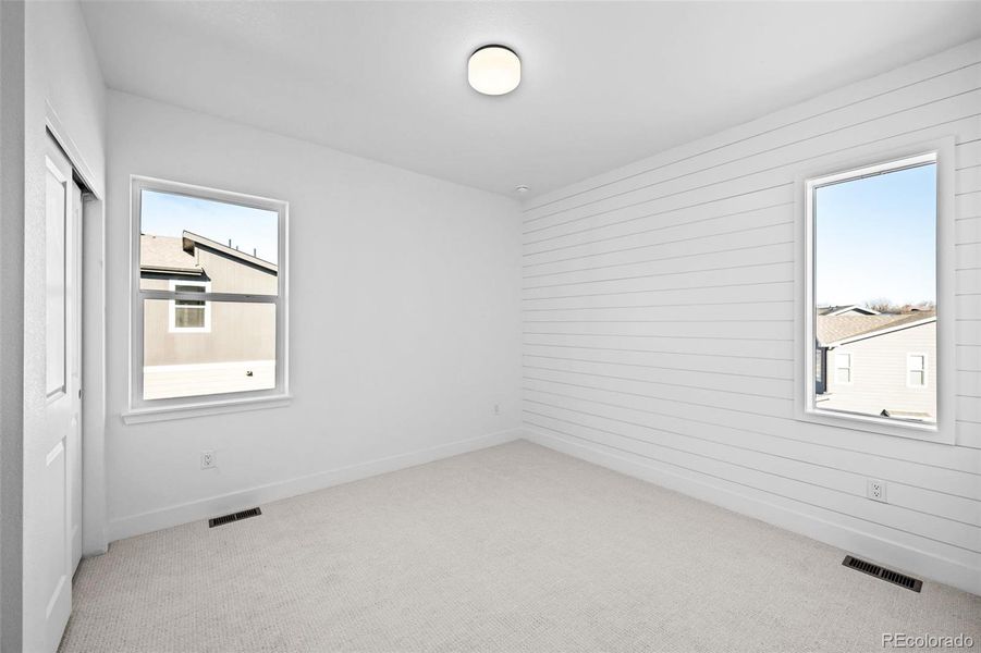 2nd bedroom with high ceilings & ensuite.