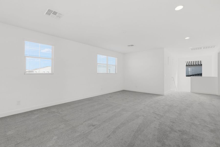 Spacious, unfurnished interior of a new home in Artisan at Asante, Surprise (Image 35).