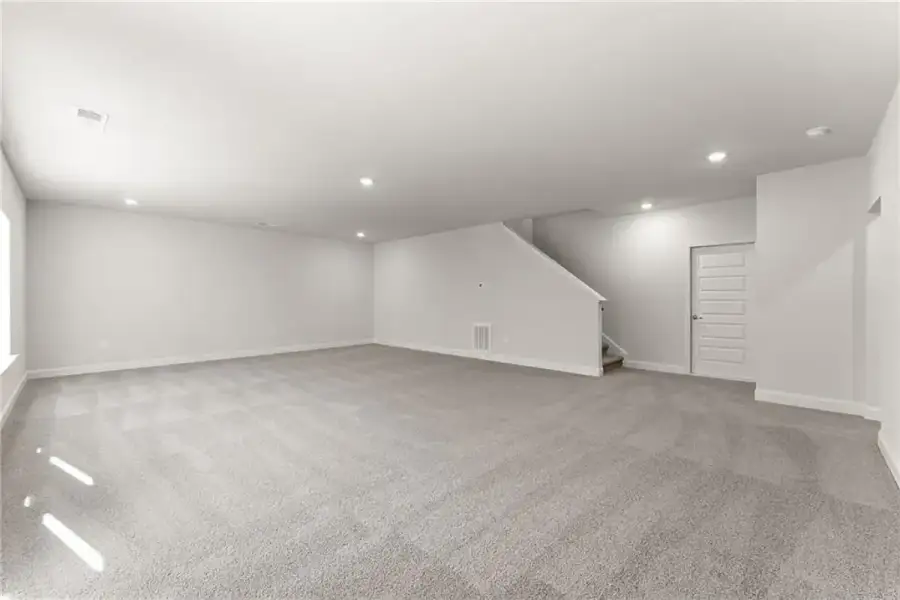Representative unfurnished interior of a home built from the 1709 by Adams Homes in Ham Farm, La Grange (Image 33).