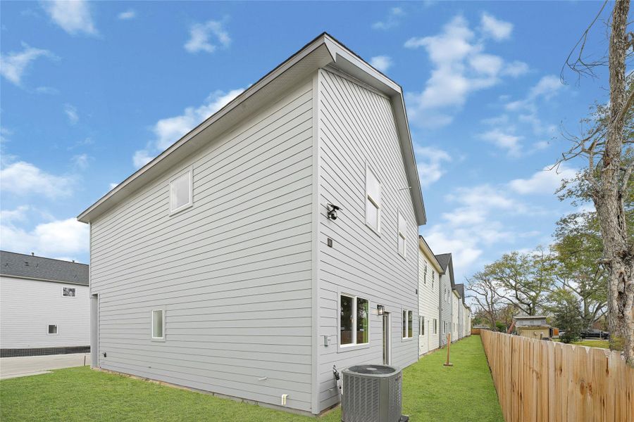 Exterior details and patio area of a home in , Houston (Image 3).