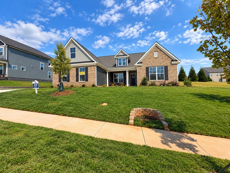 Front exterior of a new home in Robinson Oaks, Gastonia, NC, highlighting curb appeal (Image 2).