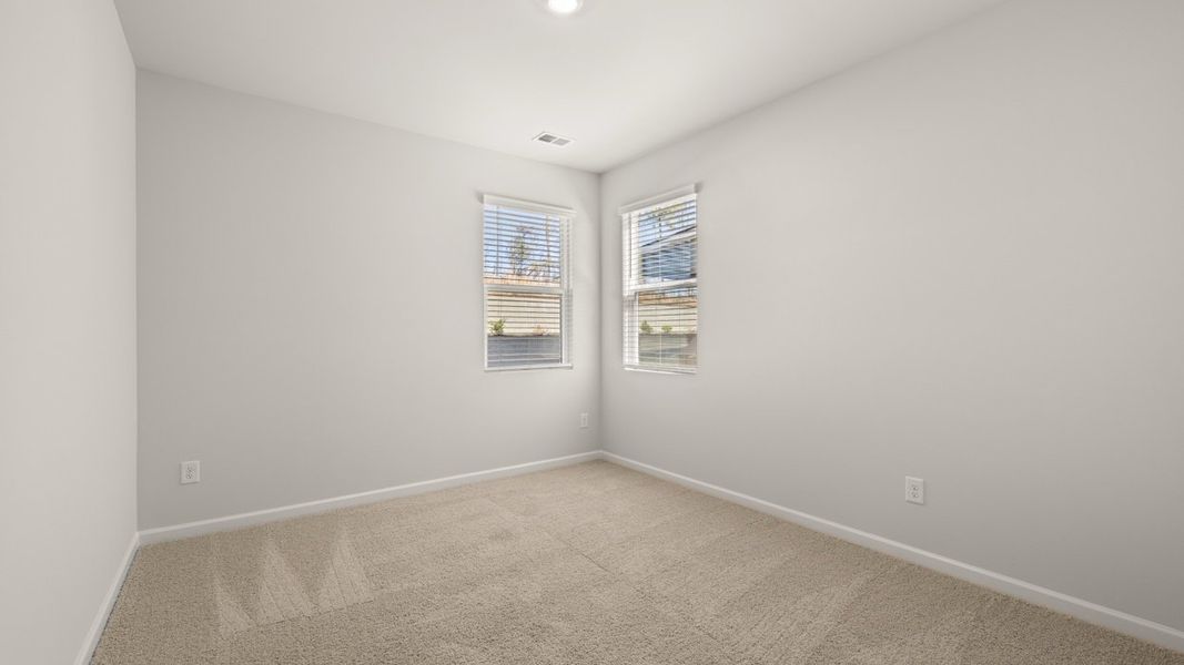 Representative unfurnished interior of a home built from the Mansfield by D.R. Horton in Southwind Village, Evans (Image 23).
