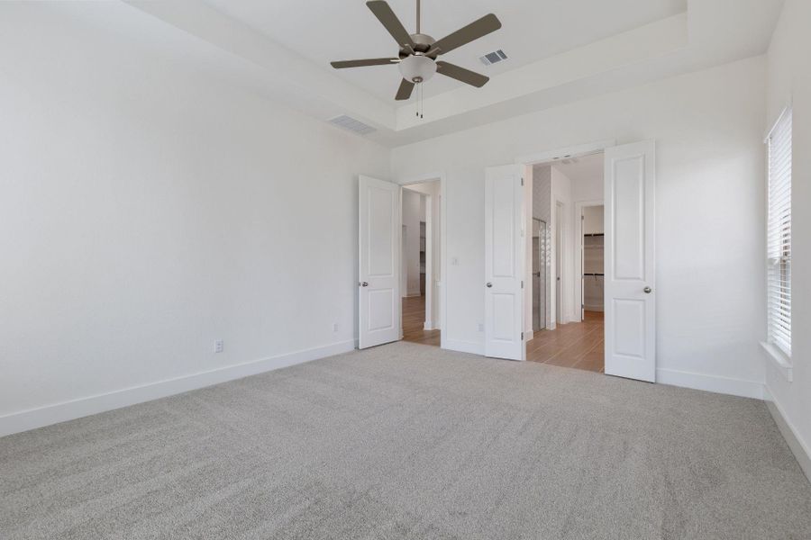 Primary Bedroom with tray ceiling Primary Bedroom with tray ceiling