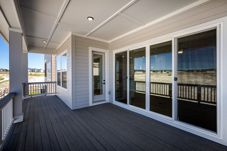 Exterior details and patio area of a home in Revel Crossing at Wolf Ranch - The Panorama Collection, Colorado Springs (Image 3). Exterior details and patio area of a home in Revel Crossing at Wolf Ranch - The Panorama Collection, Colorado Springs (Image 3).