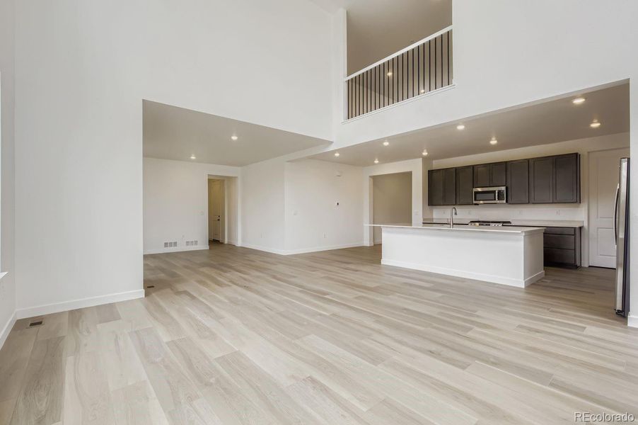 Spacious, unfurnished interior of a new home in Riano Ridge: The Grand Collection, Loveland (Image 8). Spacious, unfurnished interior of a new home in Riano Ridge: The Grand Collection, Loveland (Image 8).