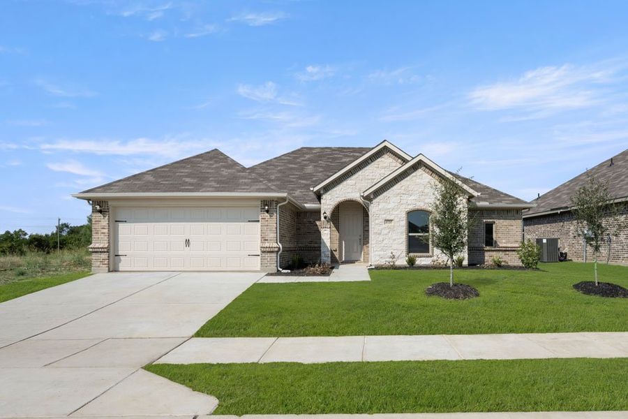 Front exterior of a new home in Still Water Lake, Godley, TX, highlighting curb appeal (Image 27). Front exterior of a new home in Still Water Lake, Godley, TX, highlighting curb appeal (Image 27).